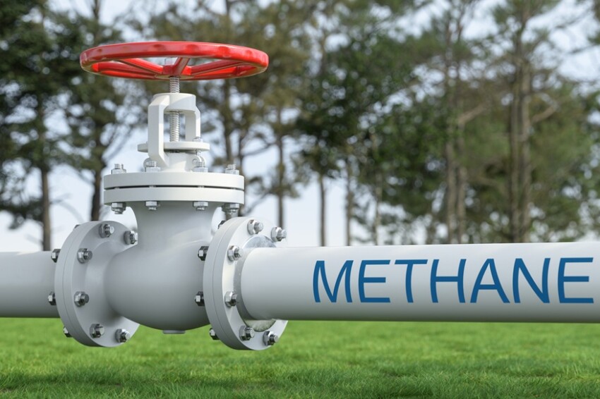 White Industrial Pipelines Transporting Methane Gas Across Green Field. Energy Infrastructure Concept
