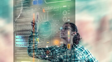 Woman using futuristic touch screen computer on a colorful background