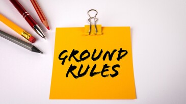 GROUND RULES. Office supplies on a white table
