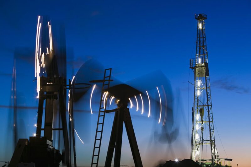 Graphic with simulated motion of a pumpjack and other equipment