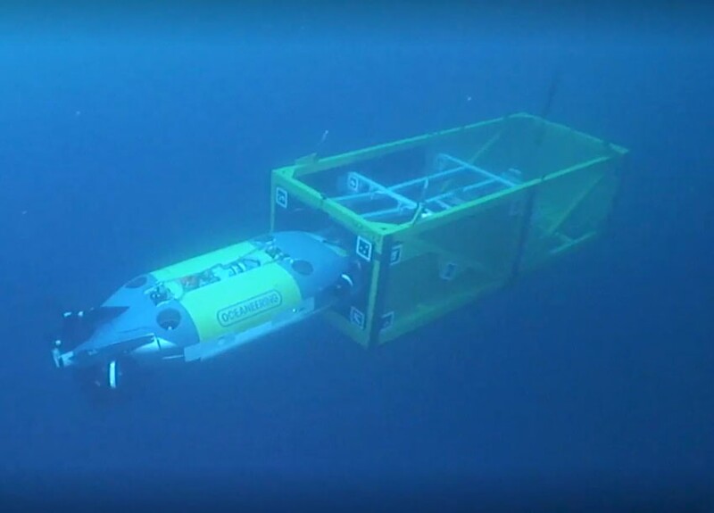 Fig. 2—The Freedom AUV captured docking with a subsea cage before being recovered. Source: Oceaneering.