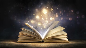 Magic Book With Glitter - Open Book With Lights Glowing In Dark Background