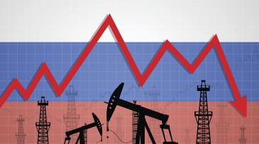 Oil derricks over Russian flag