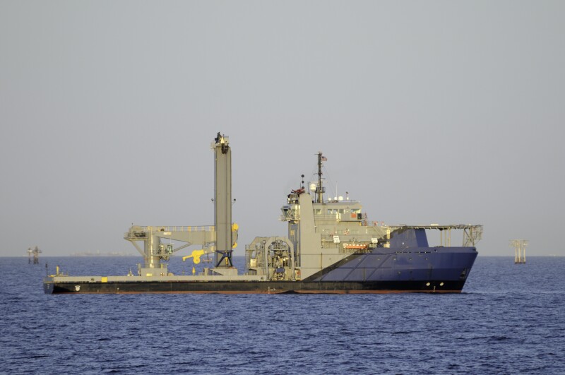 Subsea work vessel with knuckle crane and lift tower