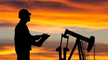 Oil Worker at Dusk