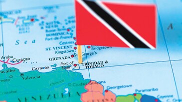 Map and flag of Trinidad and Tobago.