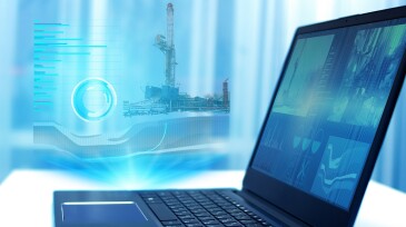a hologram on a laptop, drilling a well to monitor and analyze geology in oil and gas production. Modern technology and artificial intelligence