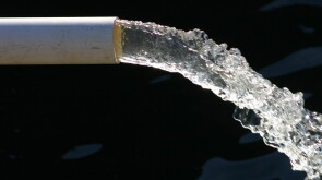 Close-up of water pipe with pouring water