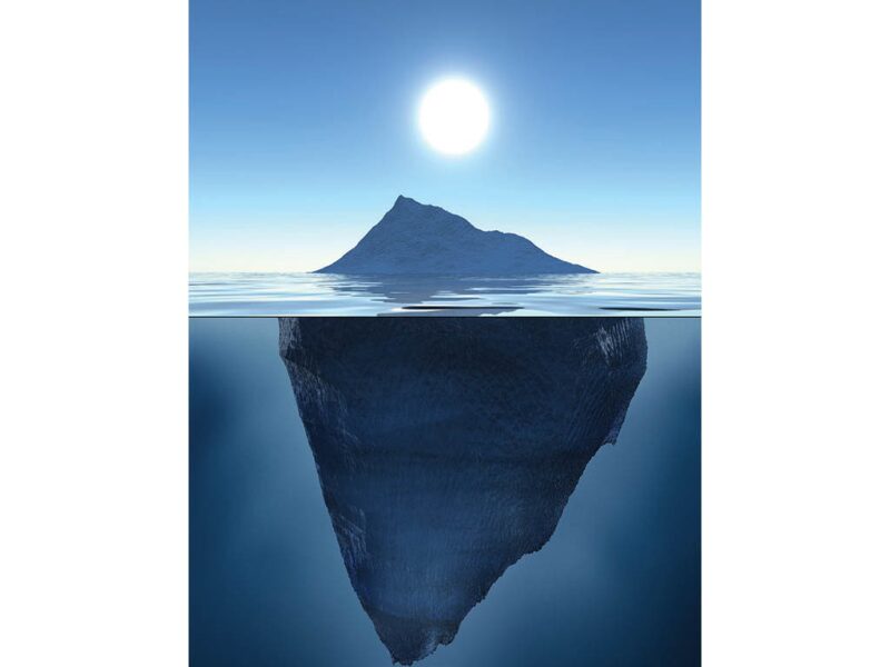 iceberg with most unseen below the water