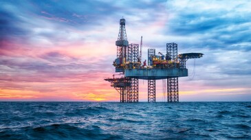 HDR of Offshore Jack Up Rig in The Middle of The Sea at Sunset Time