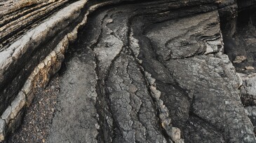 Layers of shale line coastline.