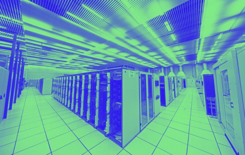 Colored image on banks of servers inside a data center