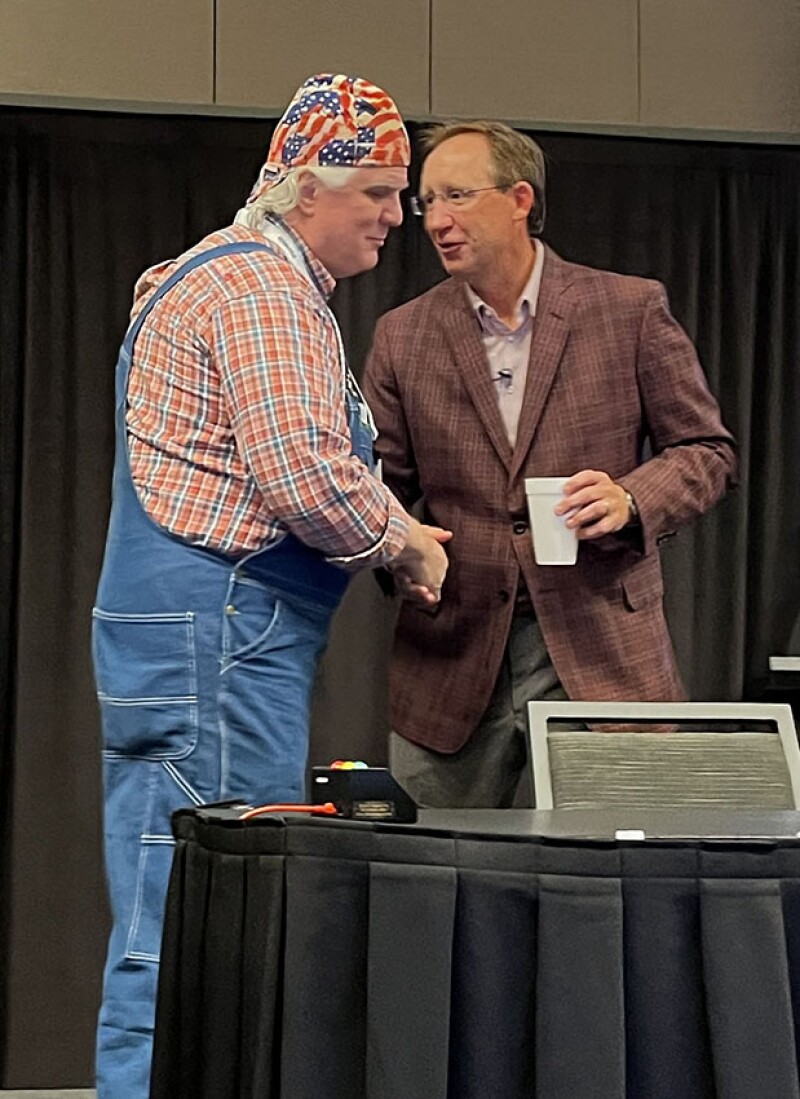 Tom Blasingame, 2021 SPE President, welcomes Lance Robertson, formerly Endeavor CEO, to the stage to deliver the lunch keynote at SPE’s Permian Basin Energy Conference in Midland on 22 October. Source: Jennifer Pallanich/JPT.