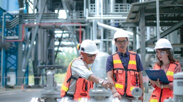 safety manager accompanied by his secretary and engineers conduct inspection