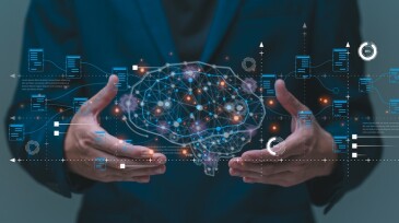 Big data and analytics visualization technology with scientist analyzing information structure on virtual screen.