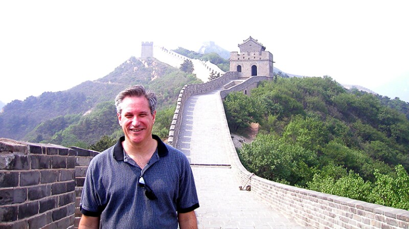 Mark visited the Great Wall of China while attending a conference in Beijing in 2006.