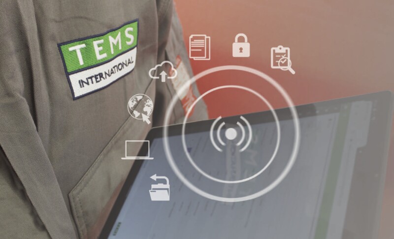 TEMS logo on worker uniform with overlay reflecting connected equipment and systems