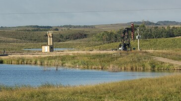 Oil well by a wetland