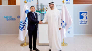 jpt-2018-10-adnoc-bhge-hand-shake-hero.png