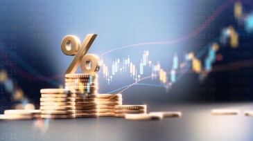 Percentage Sign On Top Of Coin Stacks Before Blue Financial Graph