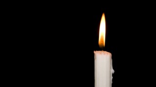 Single candle burning