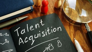 Talent acquisition sign in the note. Recruitment concept.