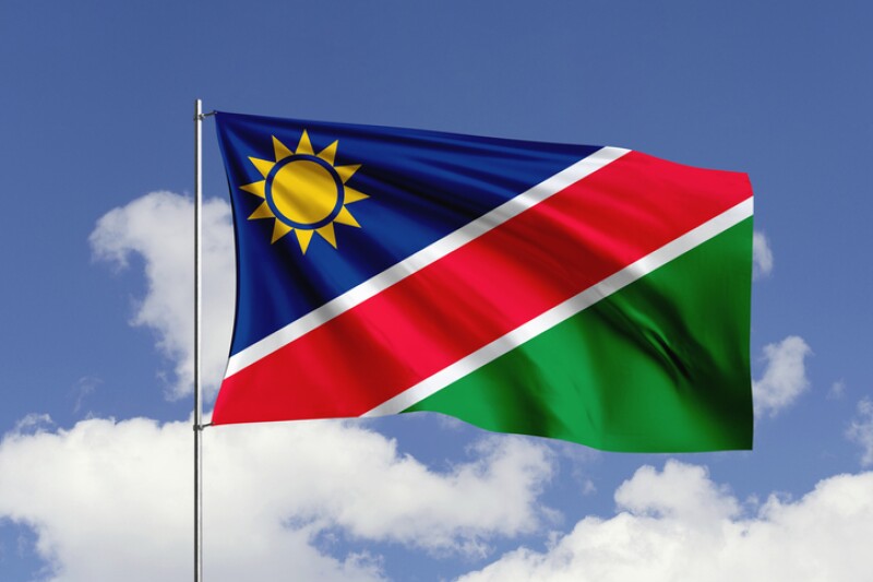 Namibia flag fluttering in the wind on sky.