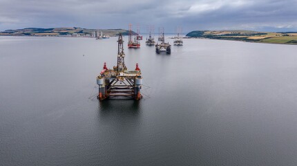 Idle drilling rigs stand offshore Scotland, some awaiting maintenance and some destined for decommissioning. Source: Getty Images.