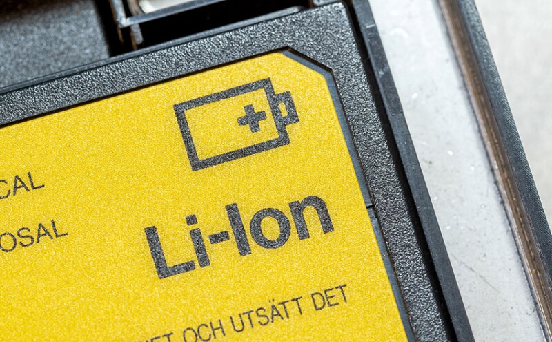 Generic Lithium Ion laptop battery, yellow Li-Ion cell for electronic devices object macro detail, extreme closeup, nobody. Lithium-Ion batteries simple icon symbol abstract concept, care, service