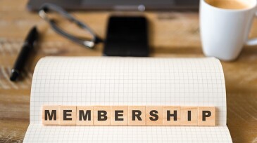 Wooden blocks with letters making Membership text