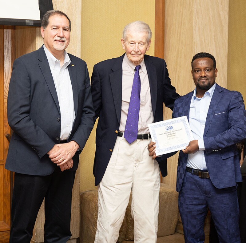 Terry attended the Regional Awards Banquet in Midland, Texas, where he helped recognize Award winners and scholarship recipients. The Permian Section gave out over $140,000 in scholarships, including this one named for 1997 SPE President T. Scott Hickman (pictured center).