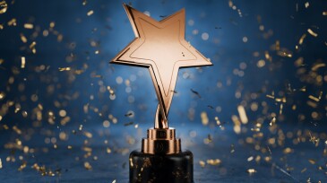 Gold star on a blue background as a reward. Top Performance Award. Winners Cup. Achievements. Victory. Goal achievement concept. Winner certificate. First place in a computer game. 3D rendering.