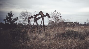 Two old pumpjacks, sometimes called a grasshopper oil pump somewhere in Texas