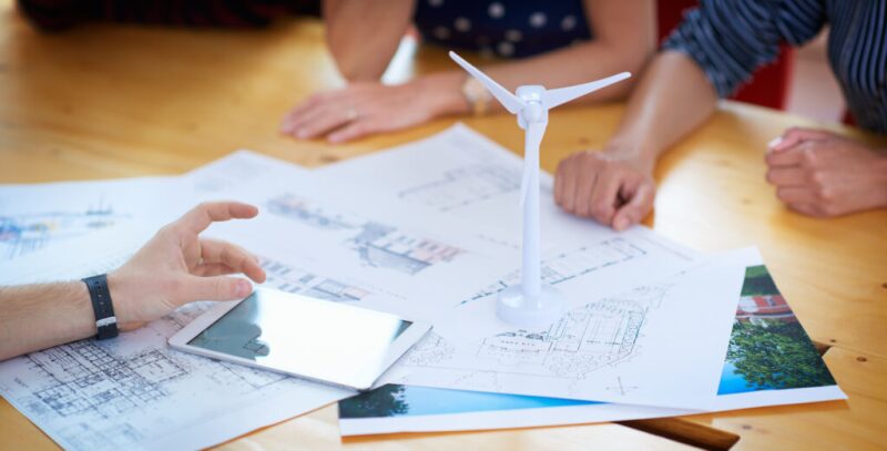 Model of a wind turbine with plans and tablet