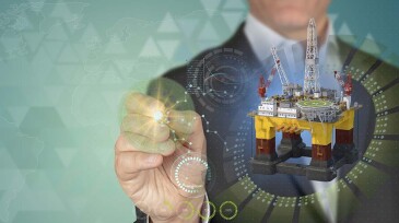 Oil and energy industry concept. Businessman pointing 3D oil rig object with pen in HUD design technological background with copy space