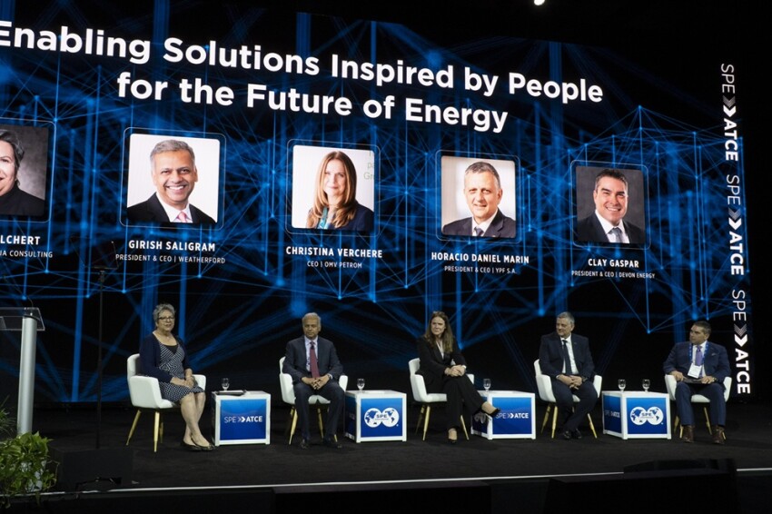 Speakers and attendees during Opening General Session