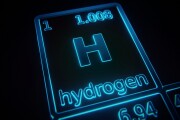 Focus on chemical element Hydrogen illuminated in periodic table of elements. 3D rendering