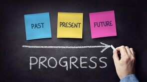 Past present and future time progress concept on blackboard