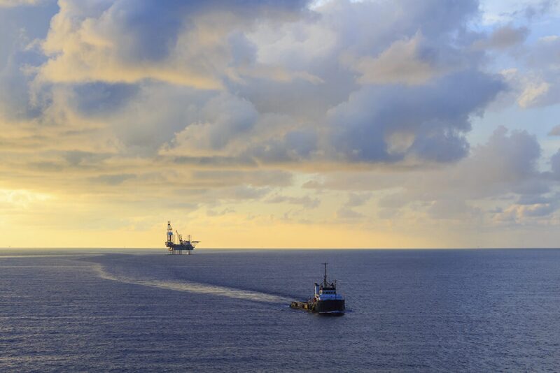 Supply boat with platform in the background