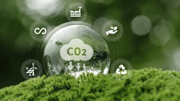 CO2 sustainability renewable recycle green energy concept. glass globe on moss for carbon emission reduction and eco-friendly environmental protection. CCS, carbon capture to net zero