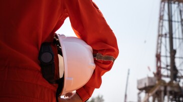 Working at drilling rig - Oil field operation action.