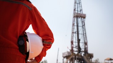 Working at drilling rig - Oil field operation action.