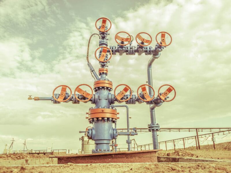 Large wellhead against a muted background