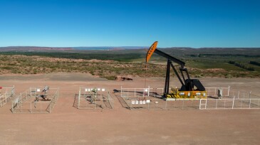 Location with oil extraction well, and secondary water injection well.