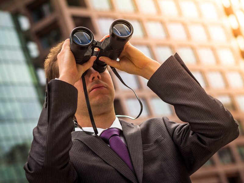 business man with binoculars