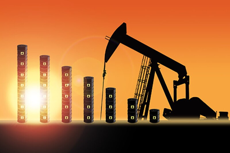 Rows of oil barrel drums decreasing in bar chart format with pump jack silhouette against a sunset sky with deliberate lens flare and copy space. Concept of decreasing oil production output or falling oil prices.