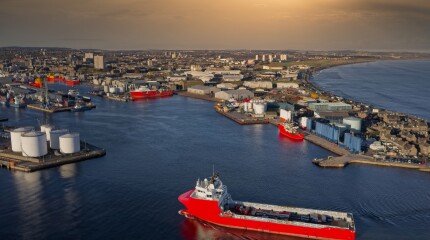 Ship arriving at Aberdeen harbour after passing Girdle Ness Lighthouse