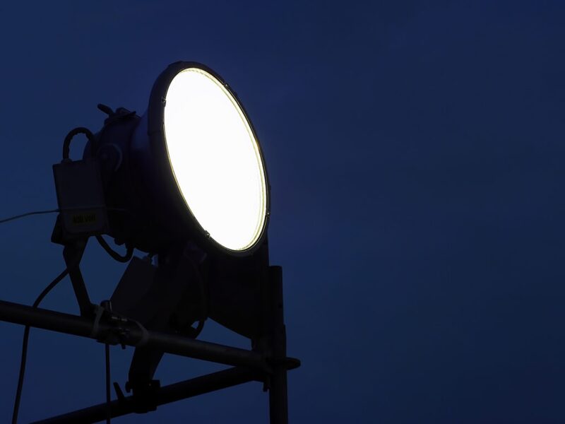 Large spotlight in darkness