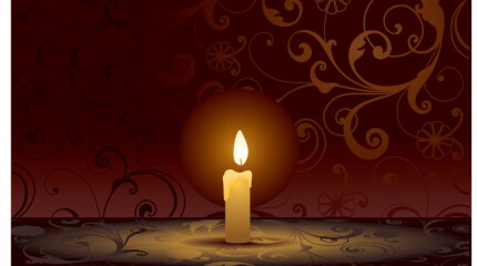 Single candle on background with scrolls